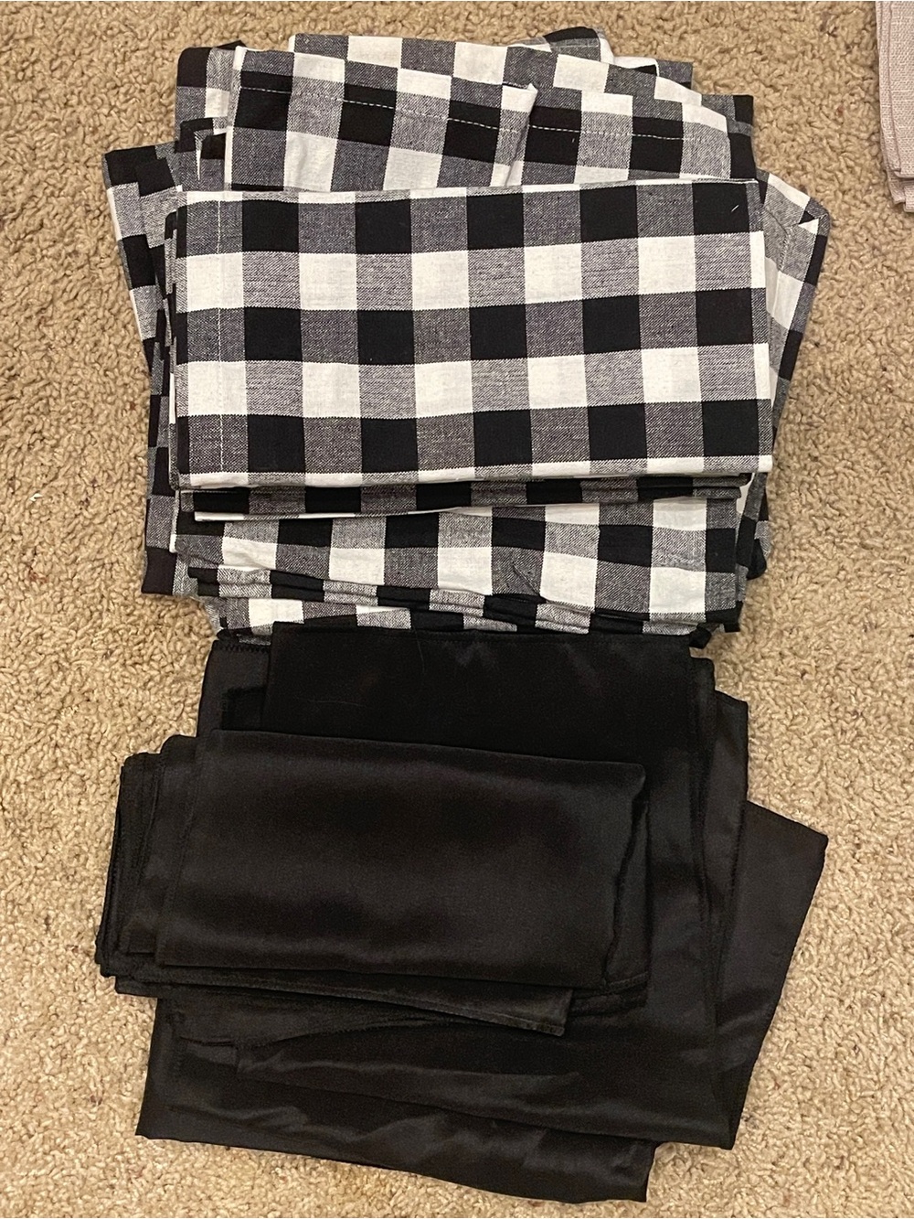 12 Black and white plaid cloth napkins and 12 solid black cloth napkins
